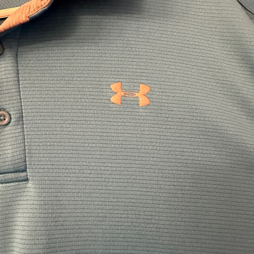 Men’s UA polo.